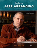 Book cover of 'Exploring Jazz Arranging' by Chuck Israels with a man writing in a sheet music notebook.