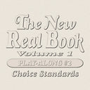 Cover of 'The New Real Book Volume 1 - Play Along #2 Choice Standards' with white text on a beige background, listing jazz standards track names.